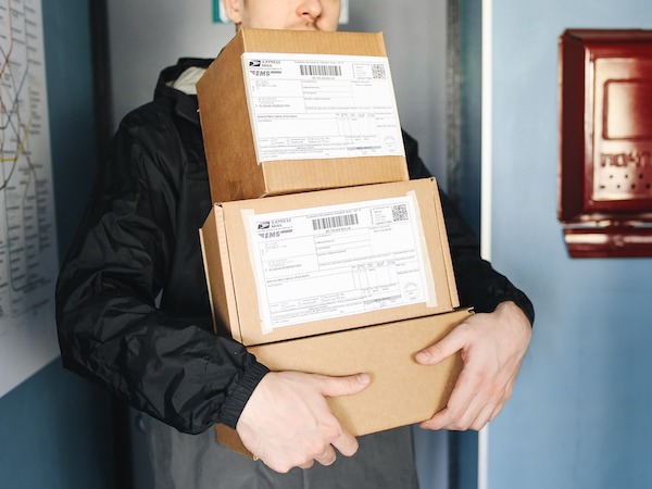 man holding some packages